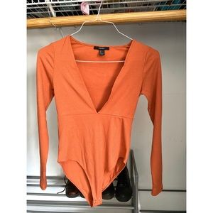 Red/orange long-sleeve bodysuit